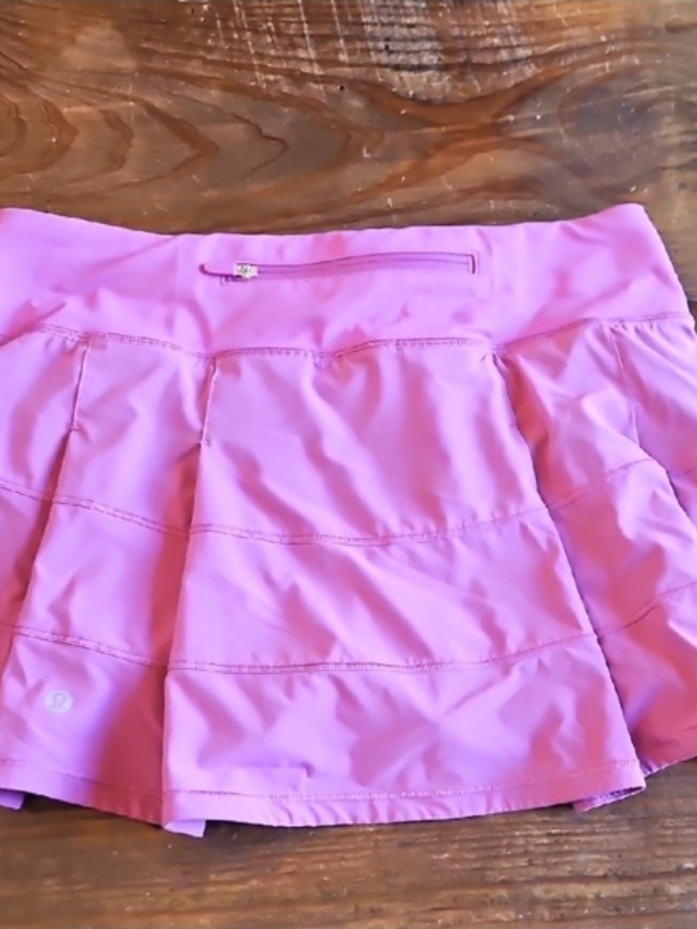 Lululemon Women's Purplish Pink Athletic Skirt with Built-In Biker Shorts.